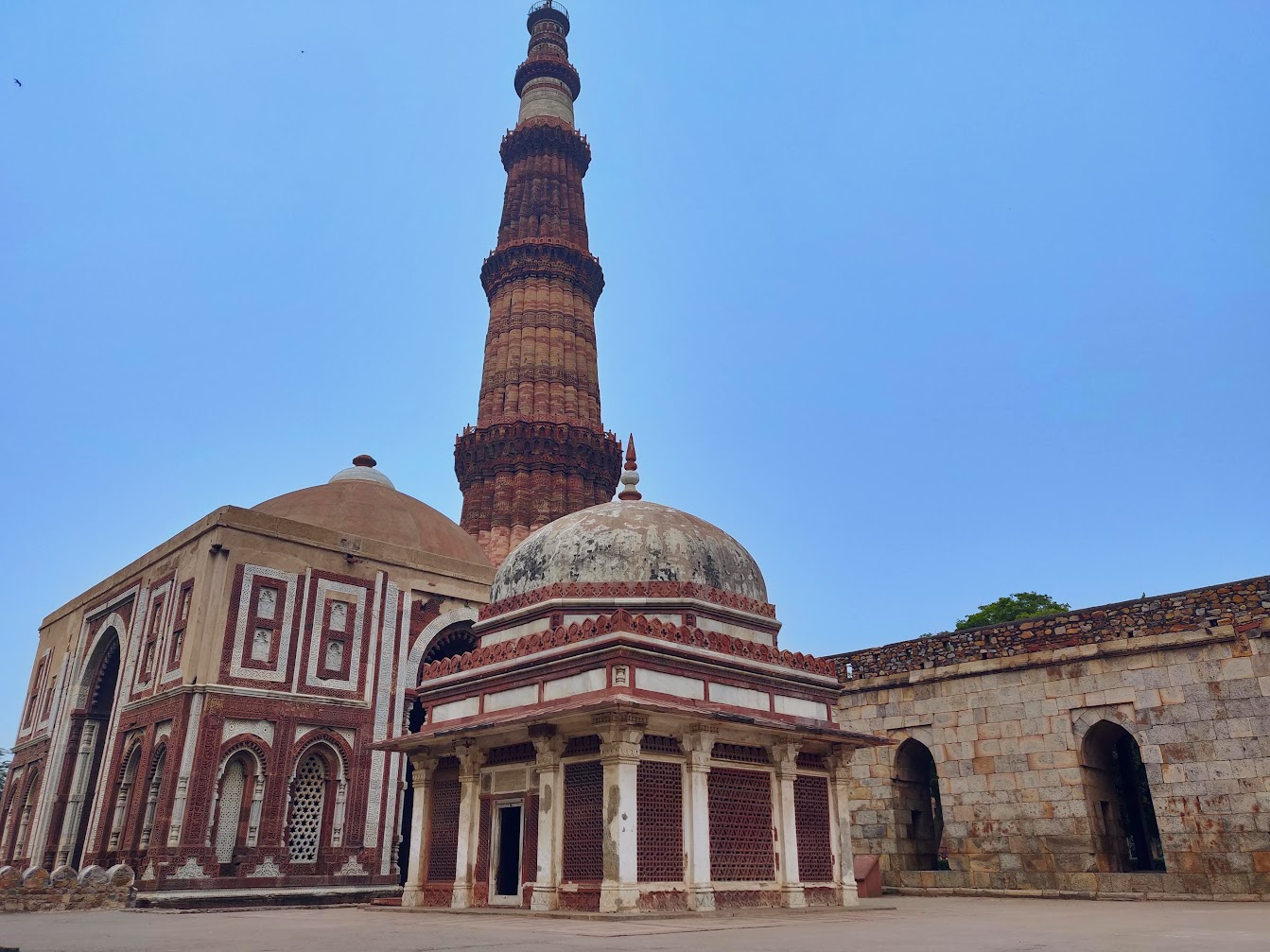 The Qutub Minar and surrounding monuments, a short walk from Siddiq Manzil